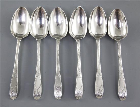 A set of six Irish silver bright cut engraved dessert spoons, Length: 7 ¼/181mm Total Weight: 7.3oz/208grms